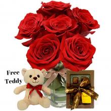 Red Roses Vase , Chocolates and a Free  Teddy Bear